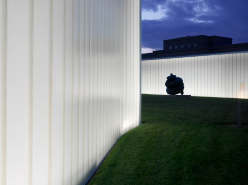 The sculpture garden, lit by the new buildings.