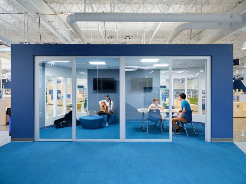 Study pods like these are acoustically private, but their transparency keeps people connected to the larger space. The structures also help create boundaries between different zones.