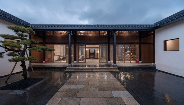 passing through the first courtyard into the lobby