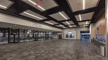 Above the common areas on the upper level, an additional 23 ceiling clouds are composed with Rockfon Tropic® acoustic stone wool panels and Infinity perimeter trim finished in Silver Satin. 