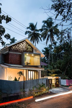 At night Corten steel facade shimmers in its own indoor lighting giving a surreal impression to the house