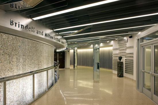 Mark Taper Forum Renovation-Los Angeles, California The Mark Taper Forum renovation upgrades theatrical systems, creates new space, and brings the historic Welton Becket-designed theater back to its original condition while complying with the Americans with Disabilities Act. The updated design employs reflective materials and thematic curved shapes to create a refreshed interior of edgy elegance that continues the Taper's reputation as the "people's theater." Outdated spaces and systems were removed, restored, or renovated to comply with historically significant elements. 
Architect: Studio 16 Architecture PLLC