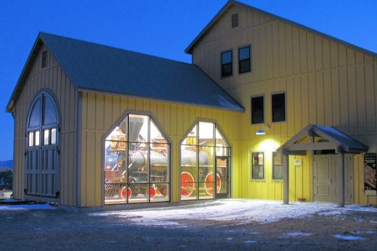 Comstock History Center-Virginia City, Nevada This 5,170-square-foot multiuse facility will house the office and boardroom of the Comstock Historic District Commission, an archeology lab, artifact storage facility, a museum containing Engine No. 18 from the historic V&T Railroad, as well as archeological artifacts that have been uncovered in the Virginia City area. The design borrows from a train shed that once occupied the site as well as the mining structures that were prevalent in the area. Extensive research was conducted on railroad buildings and particular V&T structures in the vicinity of this site prior to designing the facility so that an accurate historic building representation would be constructed. The windows in the engine bay offer an enticement to tourists visiting Virginia City to come view the 1873 train engine housed inside. 
Architect: J.P. Copoulos, Architect