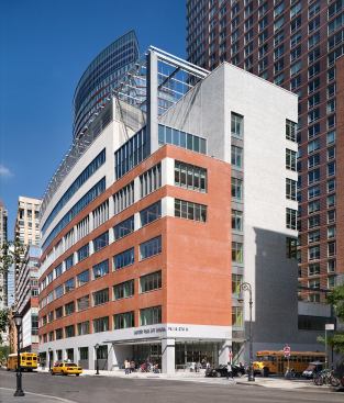 PS/IS 276 - Battery Park City School-New York, New York&nbsp; The Battery Park City School serves 950 students from prekindergarten through eighth grade and special education students. A flexible example of a "high-rise" school, the eight-story building's massing reflects the vertical orientation of the program. Public assembly spaces and pre-K through fourth grade are accommodated on the first four floors. Shared spaces, such as the cafeteria, library, art, and other specialized classrooms are on the fifth and sixth floors. The seventh and eighth floors are designed to accommodate the fifth through eighth grades. A 10,000-square-foot outdoor play roof is on the third floor. Combined with high-efficiency boilers and other equipment, extra insulation and photovoltaic solar panels, the school's energy costs are reduced by more than 25 percent. 
Architect: Dattner Architects