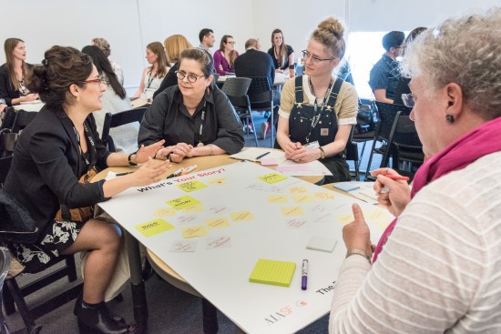Carole Wedge, FAIA (rightmost) guides a small group in the Power of Our Stories breakout, which focused on the art of storytelling and its role as a catalyst for change.