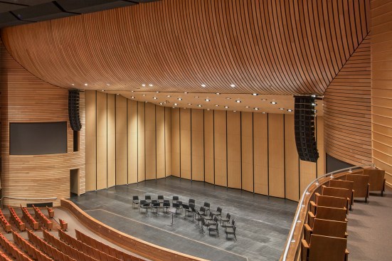 The soffit above the proscenium has a 18-foot-radius curve.