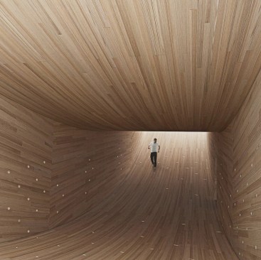 Visitors entering the Smile can ascend the cantilevered ramps.