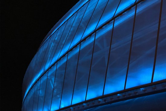 Fixtures are integrated into the architecture of the building. Custom shields block direct view of diodes and carefully manage the light spill onto the structure.