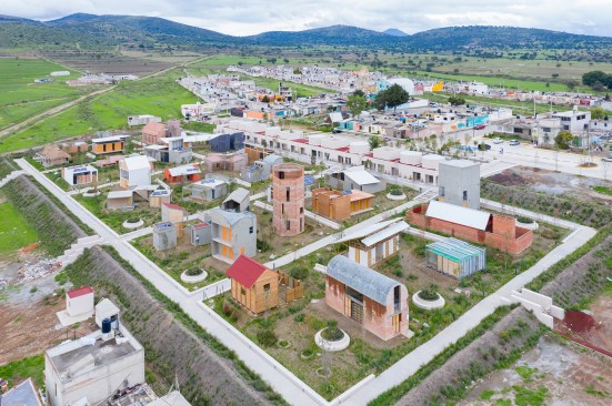 The Apan Housing Laboratory in Apan, Mexico, with a master plan by MOS. Aerial view from south.