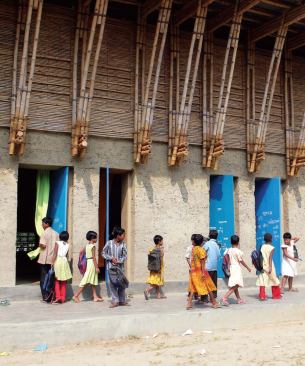 Bangladesh

School in Rudrapur, Dinajpur, Bangladesh, 2005 (Anna Heringer and Eike 
Roswag) Hand-built in four months, the two-story primary school combines
 earthbound materials like loam and straw with bamboo sticks and nylon 
lashing.