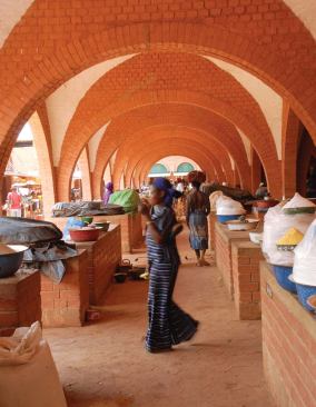 Burkina Faso

Central Market, Koudougou, Burkina Faso, 2005 (Swiss Agency for 
Development and Cooperation, Laurent Séchaud, and Pierre Jéquier) 
Located in the capital of the West African republic of Burkina Faso 
(formerly known as Upper Volta), the central market reveals the full 
potential of a humble building material. Blocks of compressed earth were
 used to form domes, vaults, and arches that ennoble the civic space.