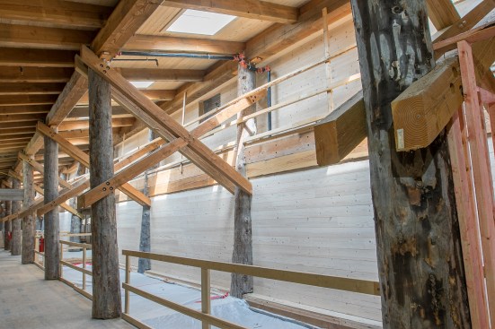 Harvested from a dead stand in Utah, the Engelmann spruce logs hand to be hand-notched due to their large diameters.