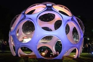 Buckminster Fuller and Norman Foster  Photography: Getty Images  Design Miami  As part of a Design Miami satellite exhibition called “Architecting the Future,” British architect Norman Foster restored both Buckminster Fuller’s geodesic dome and his famous omnidirectional, jump-jet car, the Dymaxion.