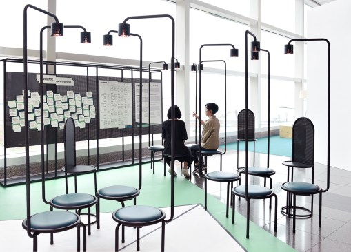 New Office Works’s installation for the M+ Museum at Art Basel Hong Kong was based on the idea of a “human library,” in which visitors engage the staff in conversations about the museum.