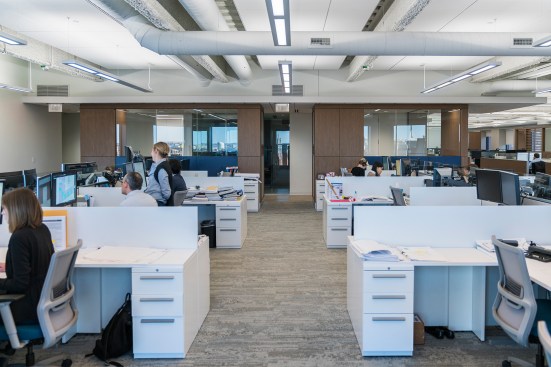 The team selected pendants with 85 percent indirect illumination to give the impression of a more voluminous space.