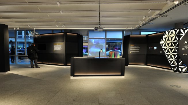 The exhibition space in Arup's London office features LED spotlights that double as Bluetooth beacons.