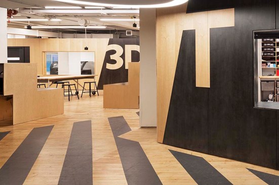 The largeness of the continuous shared work space is moderated by R+L's graphic plywood work/storage installations and two enclosed spaces - a small tool library and ventilated 3D printing room. Both rooms, as well as enclosed spaces in the Center's lower level, are articulated as discreet plywood boxes that leave the space as a whole intact.