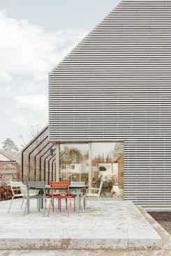 The natural stone terrace extends the first floor of the house into the garden. 