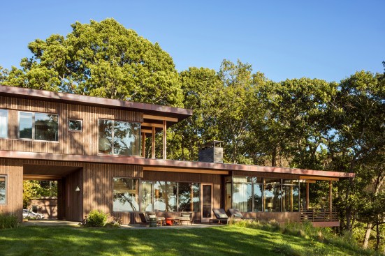 West elevation detail of  broad cantilevered overhangs which create external living areas