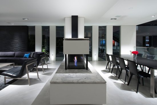 Georgina Avenue Santa Monica modern open plan home dining and living room fireplace