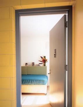 Clever design and stylish product specs, including satin-etched glass and ceramic-faced blocks, lend a sophisticated touch to this affordable project.