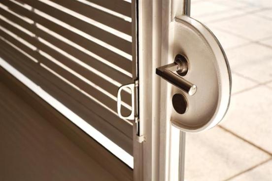 Custom+door+hardware+leading+to+the+terrace.