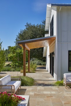 A wooden awning was added  at the front door to mark the threshold being crossed.    