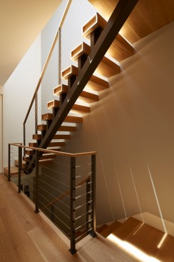 The new stair was placed to allow for the creation of full-width rooms at the front and rear of the building.