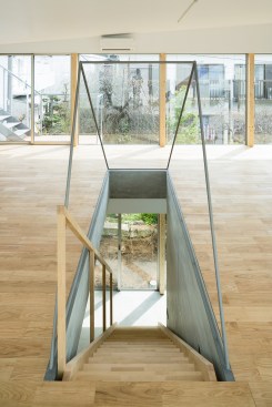 the stairs connect the floors visually as much as physically