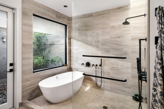 With a Full Shower, a Freestanding Tub and Luxurious Finishes, this Master Bath provides a Spa Experience
