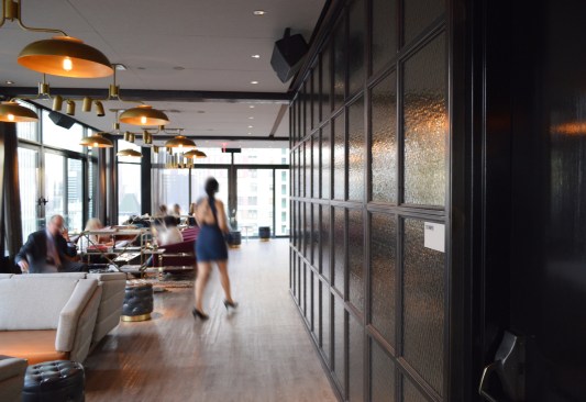 The+textured+Skylark+walls+incorporate+a+bronze-grey+color+and+Bendheim%e2%80%99s+exclusive+EcoGlass%e2%84%a2.