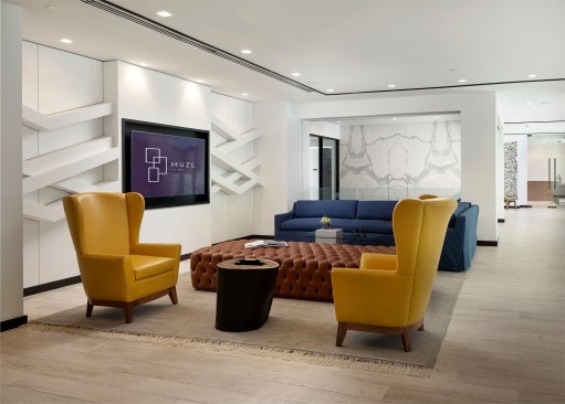 The amenity deck features a clubroom and entertainment area complete with designer lounge furniture, large screen TVs and a billiards table.