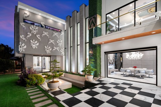 Conversation pit and water feature outside.