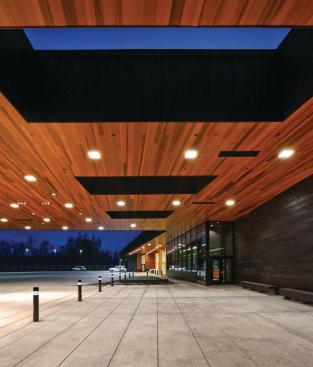 Public and inspection areas are defined by natural stained cedar.