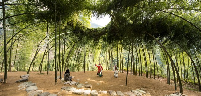 From Cooper Hewitt: Bamboo Theater by Xu Tiantian, founder of the Beijing-based firm DnA_Design and Architecture, is a living structure located in a rural village in China that treats nature like a partner rather than a resource. The open-air theater has walls of living bamboo that villagers bend and weave inward to form a vaulted space.