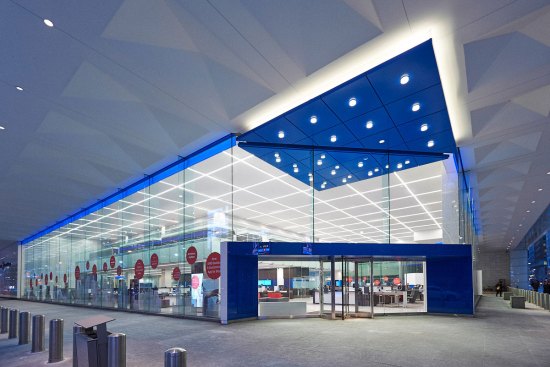 The new lighting treatment extends to the adjacent exterior sidewalk area giving the bank a greater street presence.