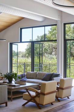 Double height windows bring in ample light and views.