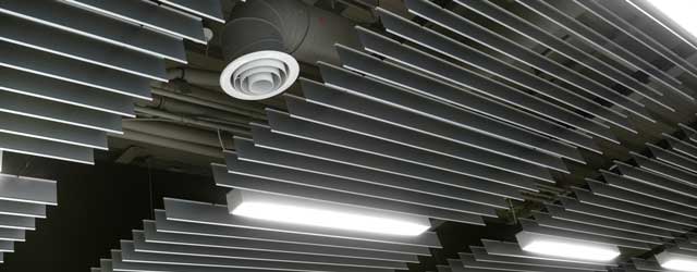 The cafeteria’s ceiling features ROCKFON Intaline metal baffles finished in Satin Silver, which give the room a focal point that seems to raise the height of the ceiling by drawing the eye upward.