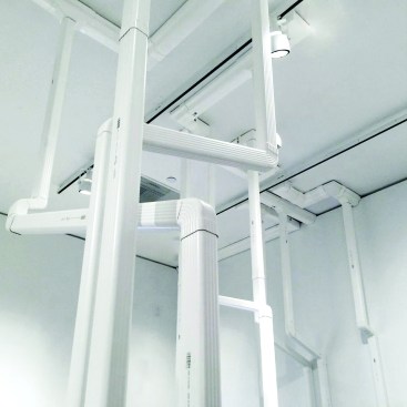 For its 2015 Architectural League Prize installation, the Beslers developed a network of gutters that bent around existing gallery track lighting to showcase the potential of commonly available building materials.