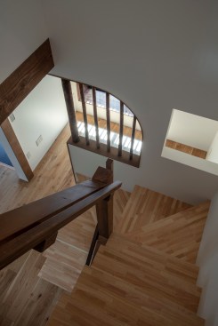 View of the staircase space, looking towards the downstairs TV/guest room