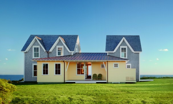 The residence incorporates two architectural features common to the island: the “Block Island Dormer”, where the building facade is extended into the roof with a gable, and the shed porch. Expanding on the two, the front porch became more than an applied form, it became a connector between two blocks.