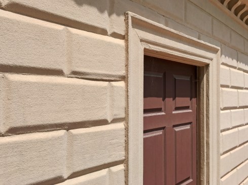 Wood siding at the Mount Vernon Estate made to look like stone.