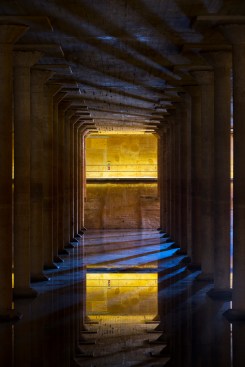Page added four new apertures to allow natural light to filter into the cistern. Water in the basin reflects the artificial and natural light, and visually extends the height of the columns.