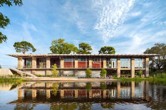 The Lost Lake Boathouse is one of very few enclosed buildings in the park because “if you look at that building, the finished floor elevation of that is above the 100-year flood plain,” McCready says. “It’s one of the only sites in the corridor that you can put a building.” During major floods, the lower level will be submerged, so it was designed to allow water to flow through. 
