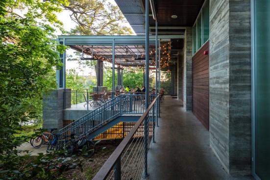McCready says that pacing the park plantings was critical, with some being more sparse, and others, like those of this restaurant patio in the Lost Lake Boathouse, being more lush. “We worked with what was already there, but we added trees or manipulated grading to encapsulate different moments as you’re traversing the park,” he says.