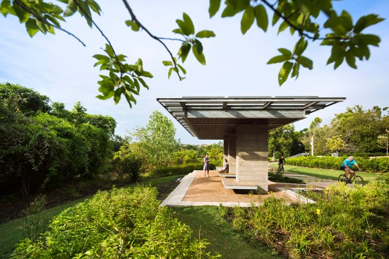“Too much shade is really impossible to get in Houston,” Page senior principal Lawrence W. Speck says of the oversized metal roofs that top the pavilions in the park. On the open-air structures down in the flood plain, that shade provides respite from the intense Texas sun for people on the Bayou trails, and the thermal mass of the concrete helps keep the shaded areas cool.