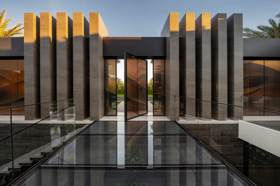 Serenity Indian Wells luxury home modern architectural design & pivot door front entrance