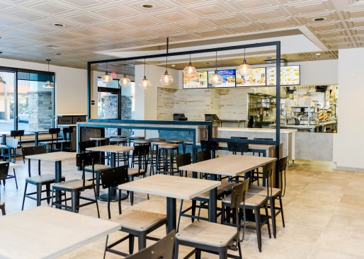 The washable Ceilume ceiling panels extend over the food preparation areas to visually unify the dining areas and exposed kitchens, part of Taco Bell’s Modern Explorer concept.