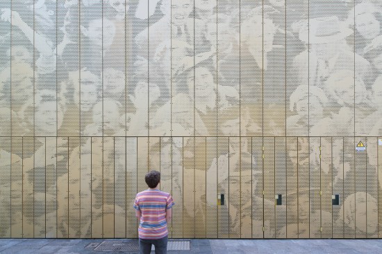 McDonald's Rotterdam facade with heart-shaped perforations depicting a Rotterdam crowd