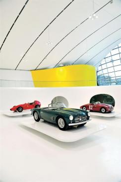 The+yellow+of+the+building+exterior+reappears+inside+on+the+volumes+that+enclose+ticketing+and+restrooms.